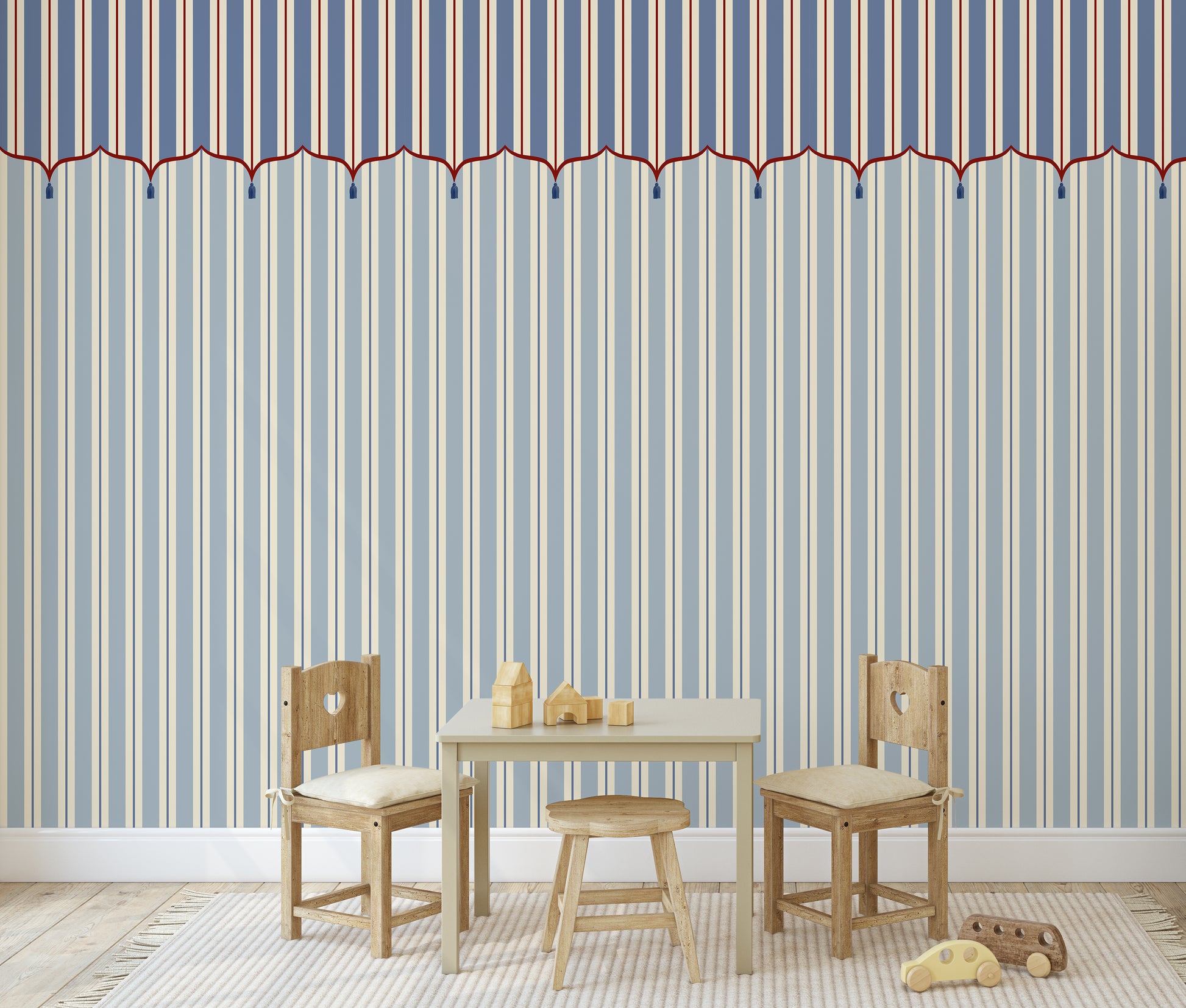 Children's table and chairs with striped wallpaper in a room.